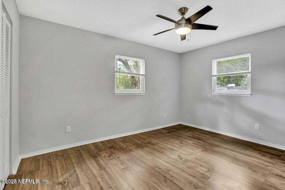 3645 Edison Avenue Jacksonville, FL 32254 - Photo 17 of 21 a view of a room with a window and a ceiling fan