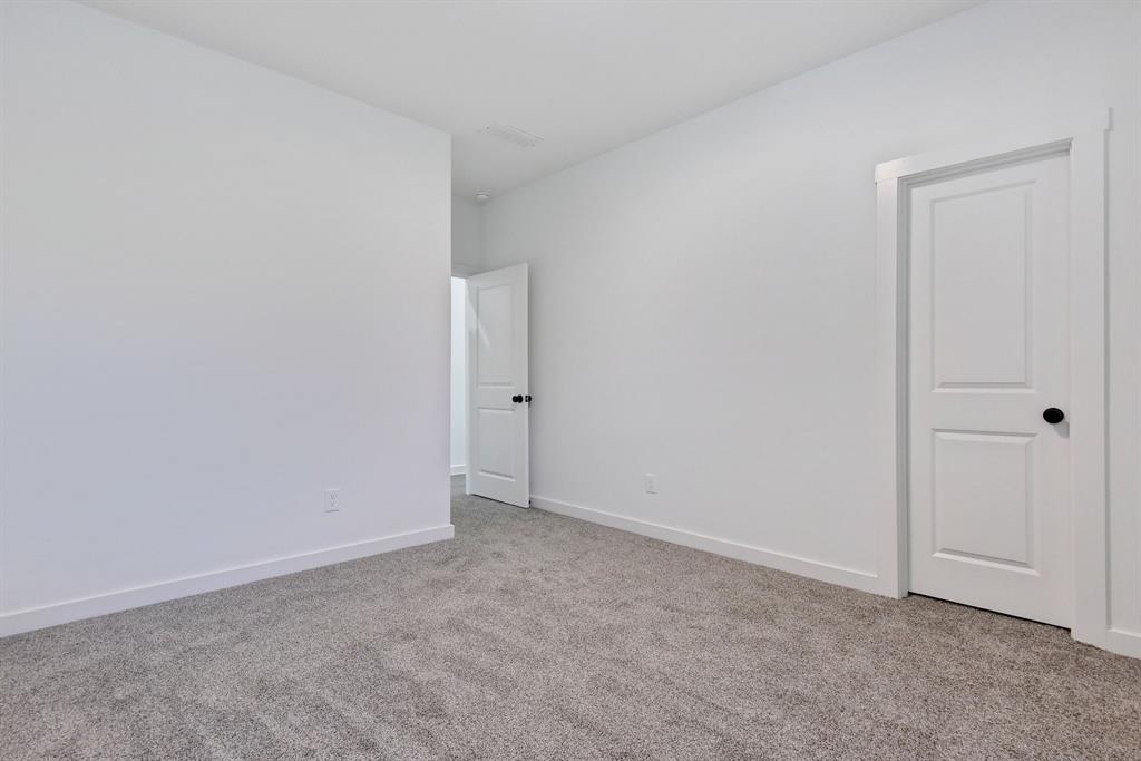 718 West Texas Street Denison, TX 75020 - Photo 11 of 22 a view of an empty room