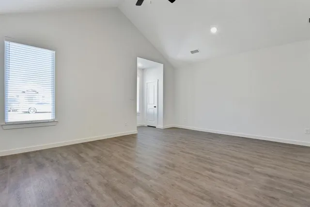 a view of kitchen with wooden floor