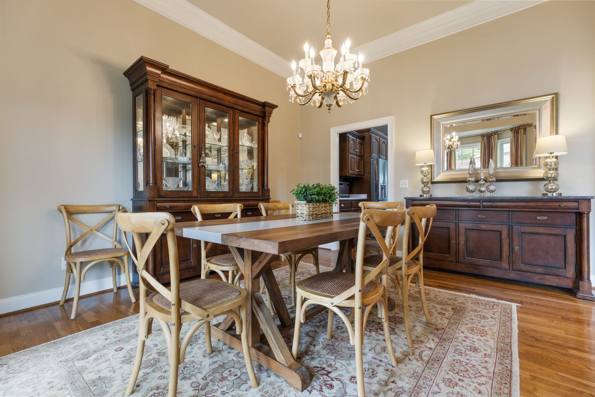 116 Courtside Lane Tullahoma, TN 37388 - Photo 17 of 90 a view of a dining room with furniture a chandelier and wooden floor