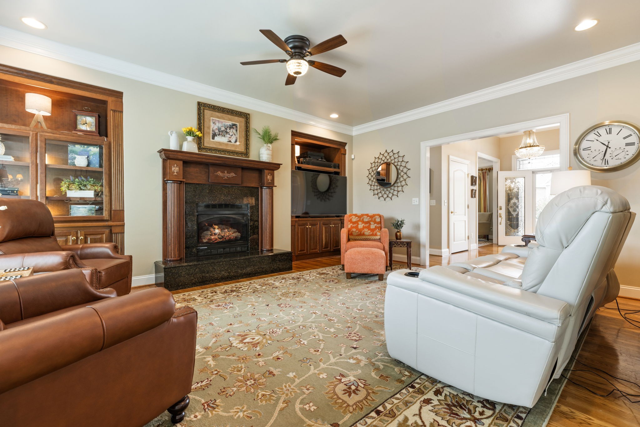 116 Courtside Lane Tullahoma, TN 37388 - Photo 35 of 90 a living room with furniture a fireplace and a flat screen tv