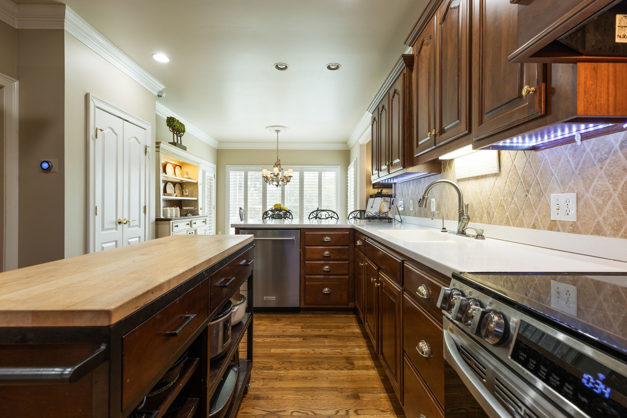 116 Courtside Lane Tullahoma, TN 37388 - Photo 45 of 90 a kitchen with stainless steel appliances granite countertop a sink a stove and a wooden floors