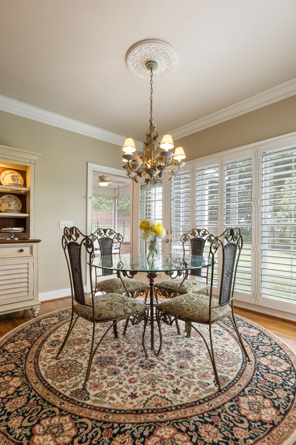 116 Courtside Lane Tullahoma, TN 37388 - Photo 49 of 90 a view of a dining room with furniture a chandelier and wooden floor
