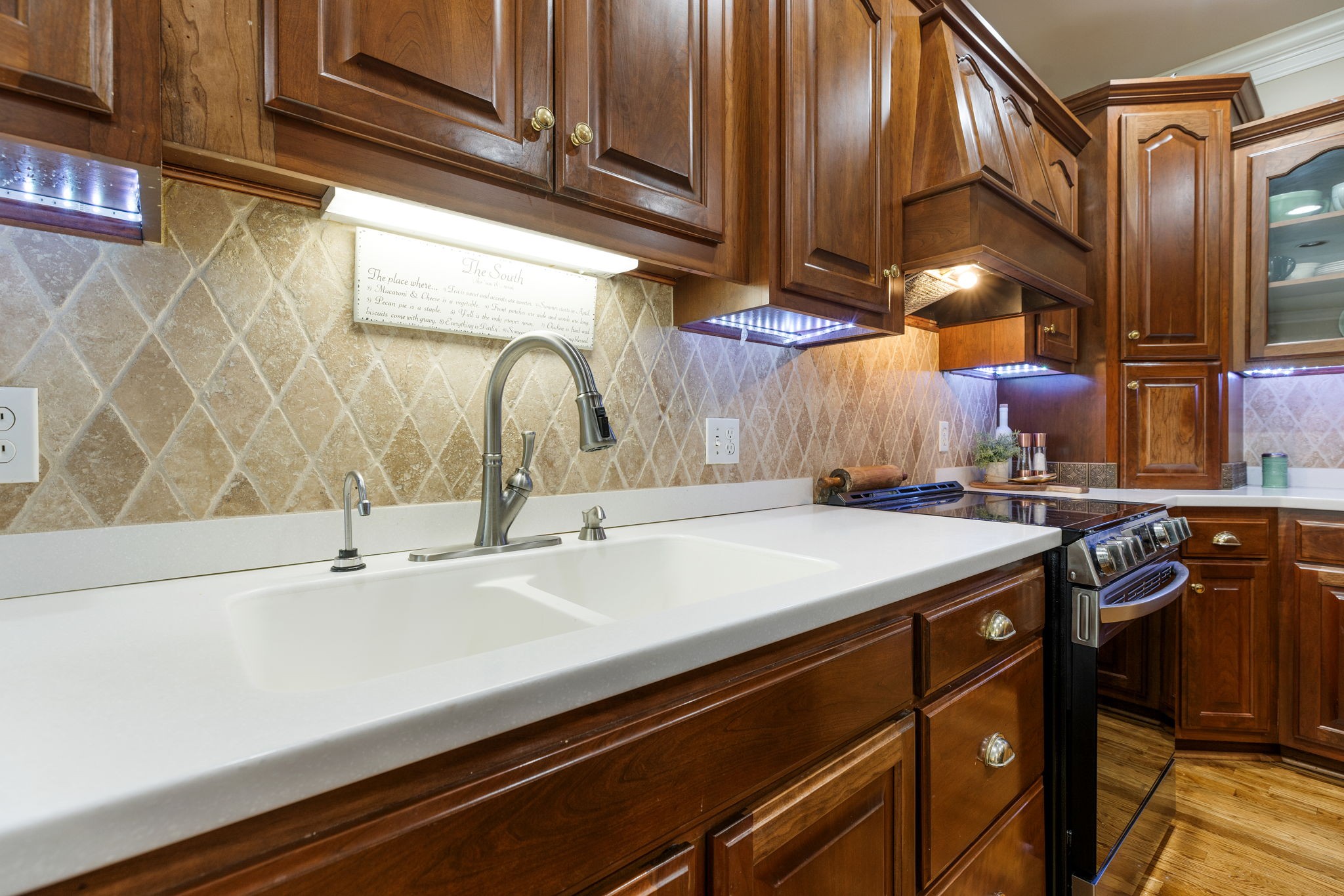 116 Courtside Lane Tullahoma, TN 37388 - Photo 50 of 90 a kitchen with stainless steel appliances a sink and cabinets