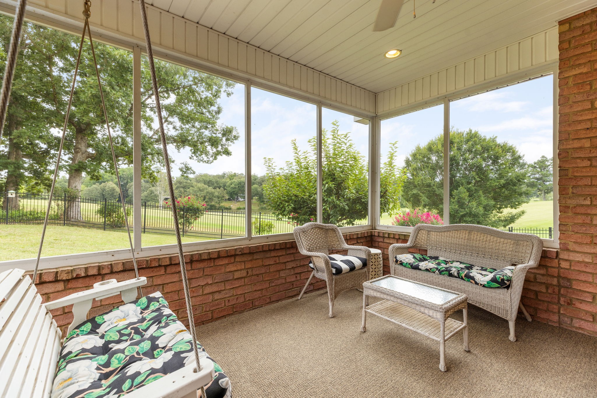 116 Courtside Lane Tullahoma, TN 37388 - Photo 73 of 90 a living room with patio furniture and a floor to ceiling window