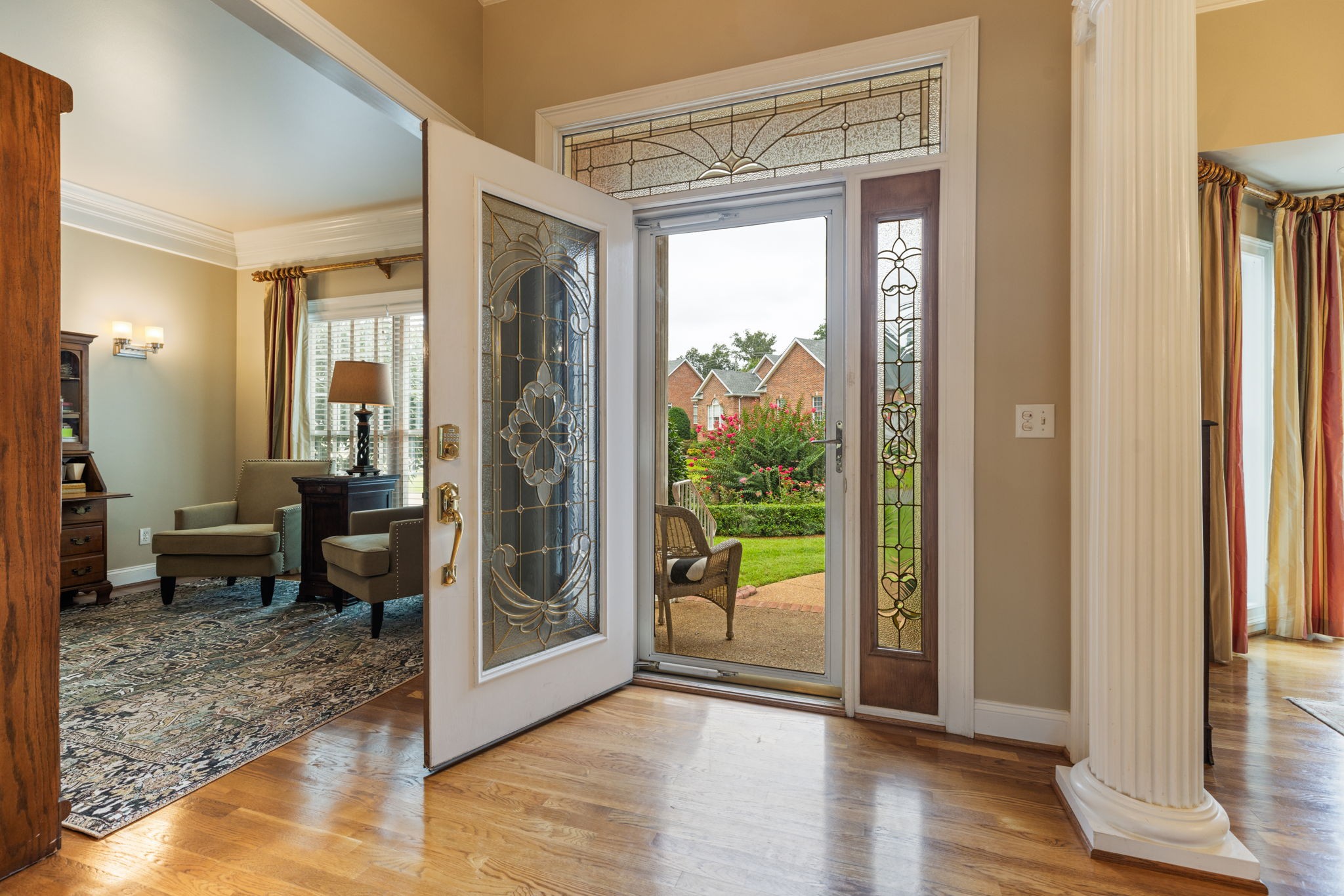 116 Courtside Lane Tullahoma, TN 37388 - Photo 10 of 90 a view of a room with large windows and wooden floor