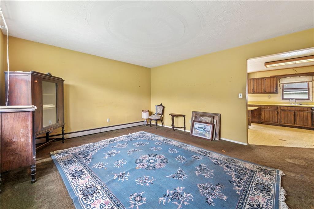 1298 Old State Road Apollo, PA 15613 - Photo 14 of 30 a spacious bedroom with a bed and wooden floor