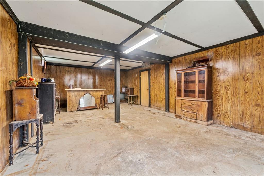 1298 Old State Road Apollo, PA 15613 - Photo 21 of 30 a view of an empty room with wooden floor and a window