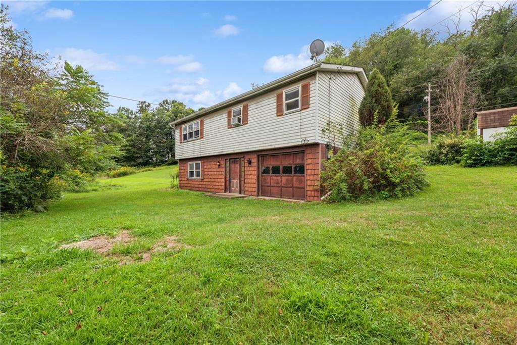 1298 Old State Road Apollo, PA 15613 - Photo 25 of 30 a view of a house with a yard