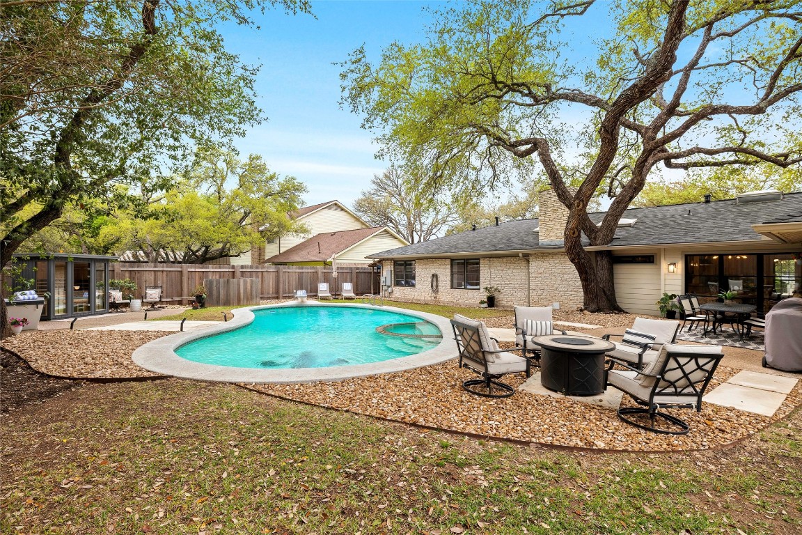 7510 Crossdraw Drive Austin, TX 78731 - Photo 1 of 1 a view of a house with backyard and sitting area