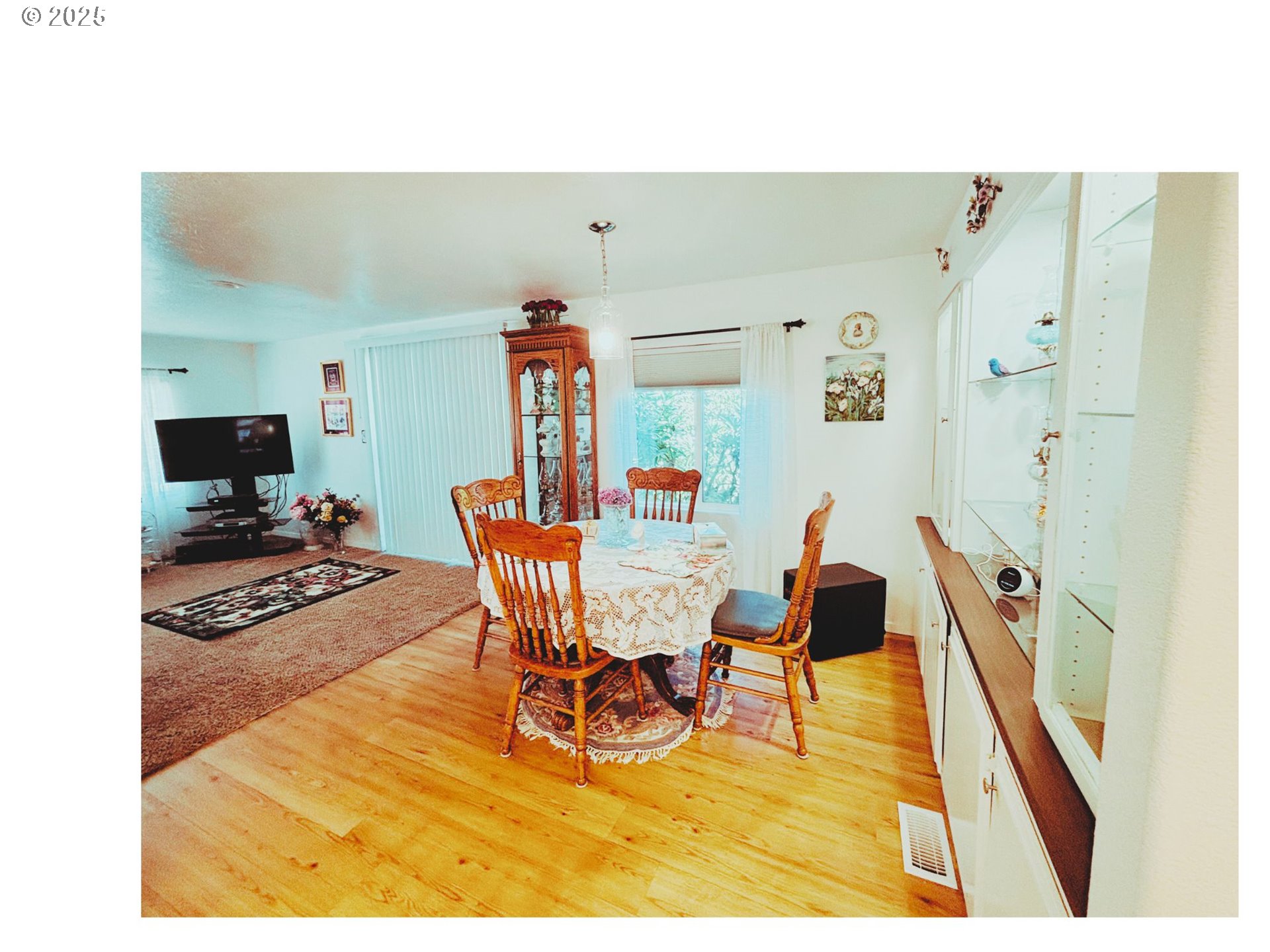 1125 58th Street, Unit 86 Springfield, OR 97478 - Photo 12 of 44 a living room with furniture and a flat screen tv