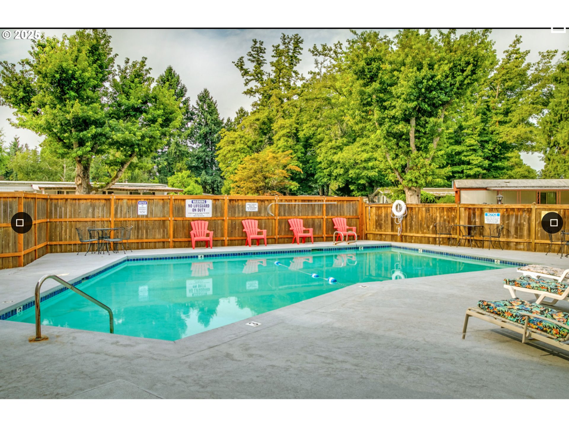 1125 58th Street, Unit 86 Springfield, OR 97478 - Photo 42 of 44 a view of a swimming pool with a patio