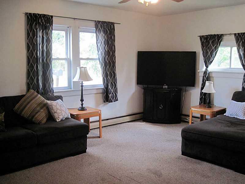 2515 Ridge Rd Extension Economy, PA 15005 - Photo 2 of 18 Living Room. Three windows offer plenty of natural lighting! Updated windows and window treatments.