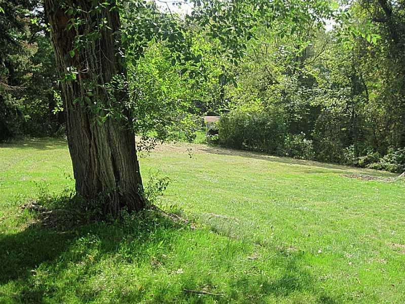 2515 Ridge Rd Extension Economy, PA 15005 - Photo 18 of 18 Yard/Garden. Lovely treed yard. Plenty of room to play games, entertain guests, or have a picnic.