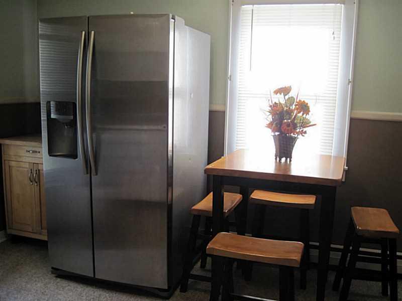 2515 Ridge Rd Extension Economy, PA 15005 - Photo 5 of 18 Kitchen. Huge stainless steel refrigerator is included with the house!