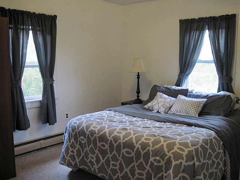 2515 Ridge Rd Extension Economy, PA 15005 - Photo 7 of 18 Master Bedroom. Master bedroom boasts two windows to provide ample natural lighting and air flow.
