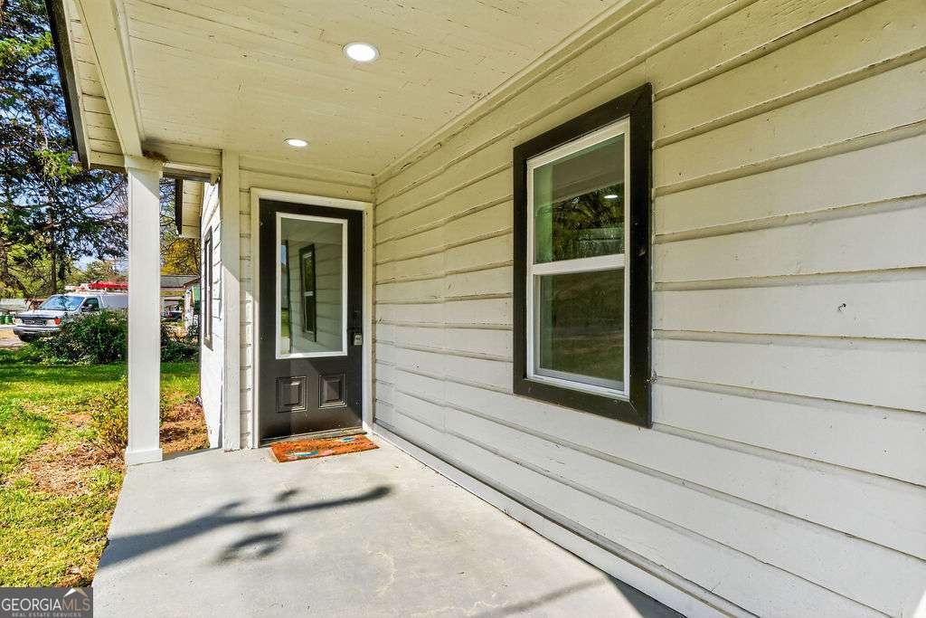 206 Walker Drive Monroe, GA 30655 - Photo 4 of 32 a view of a door of the house