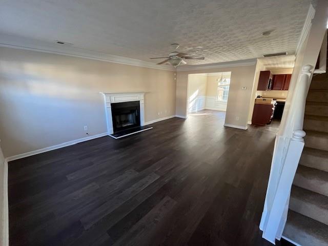 303 Millstone Drive Hampton, GA 30228 - Photo 2 of 16 a view of a livingroom with wooden floor and fireplace