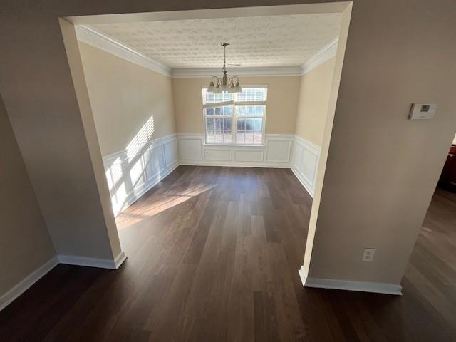 303 Millstone Drive Hampton, GA 30228 - Photo 5 of 16 an empty room with wooden floor and windows
