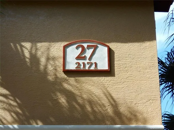 a sign that is on the side of a building