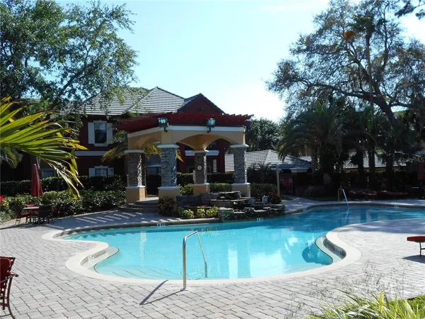 a front view of a house with swimming pool