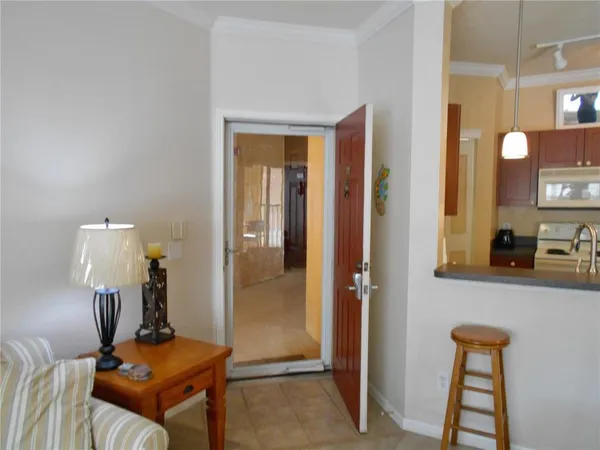 a room with furniture and wooden floor