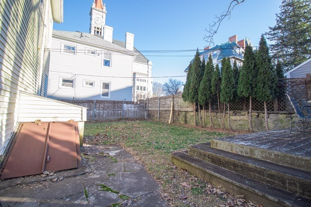 247 Rock Street Fall River, MA 02720 - Photo 7 of 30 a view of a backyard with sitting area