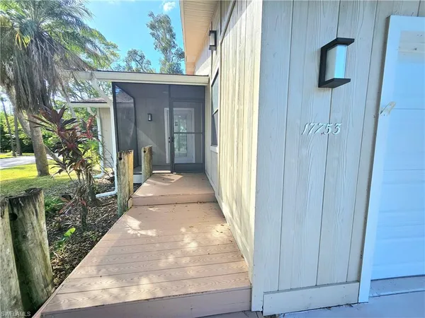 a front view of a house with a porch