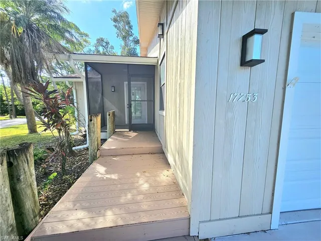 a front view of a house with a porch