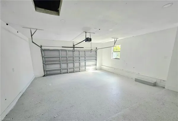 a sign that is sitting in the grass