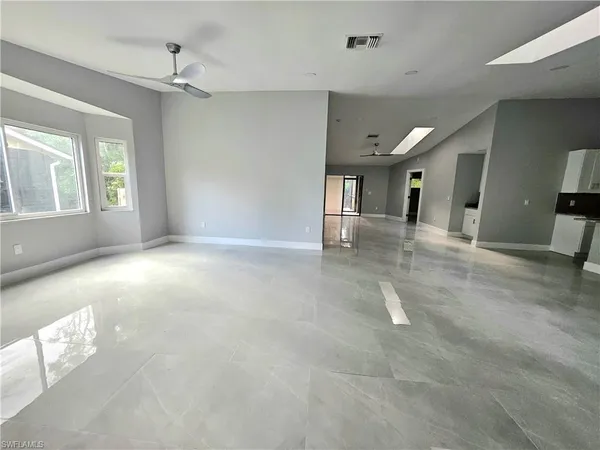 a view of a livingroom with a staircase