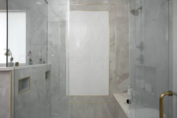 a bathroom with a shower and a sink