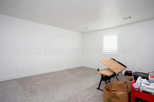 a room with furniture and a window
