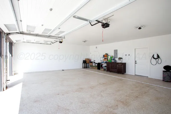 a view of a livingroom with furniture and a ceiling fan