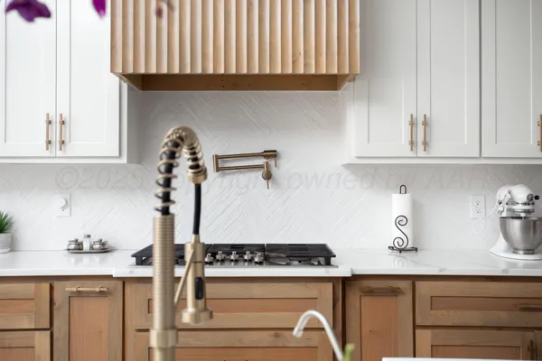 a kitchen with a cabinets and appliances