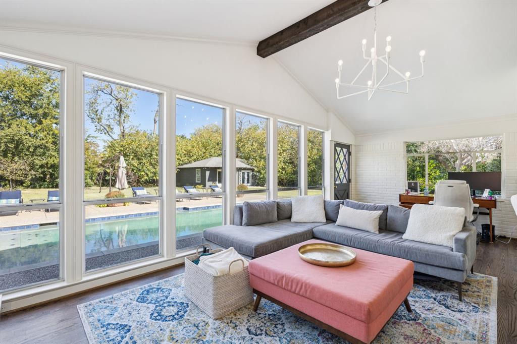 4549 Walnut Hill Lane Dallas, TX 75229 - Photo 18 of 40 a living room with furniture and a large window