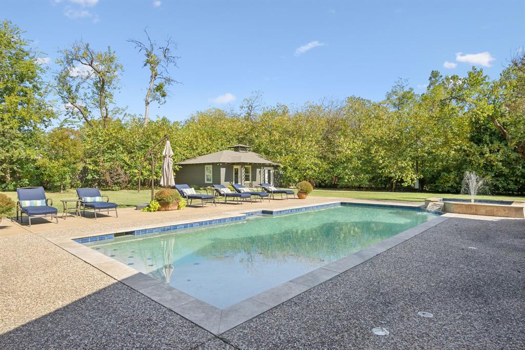4549 Walnut Hill Lane Dallas, TX 75229 - Photo 39 of 40 a view of a house with swimming pool