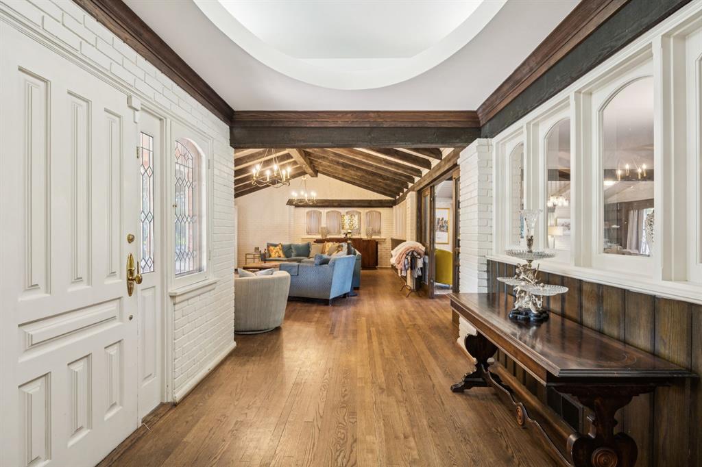 4549 Walnut Hill Lane Dallas, TX 75229 - Photo 6 of 40 a room with lots of furniture and windows