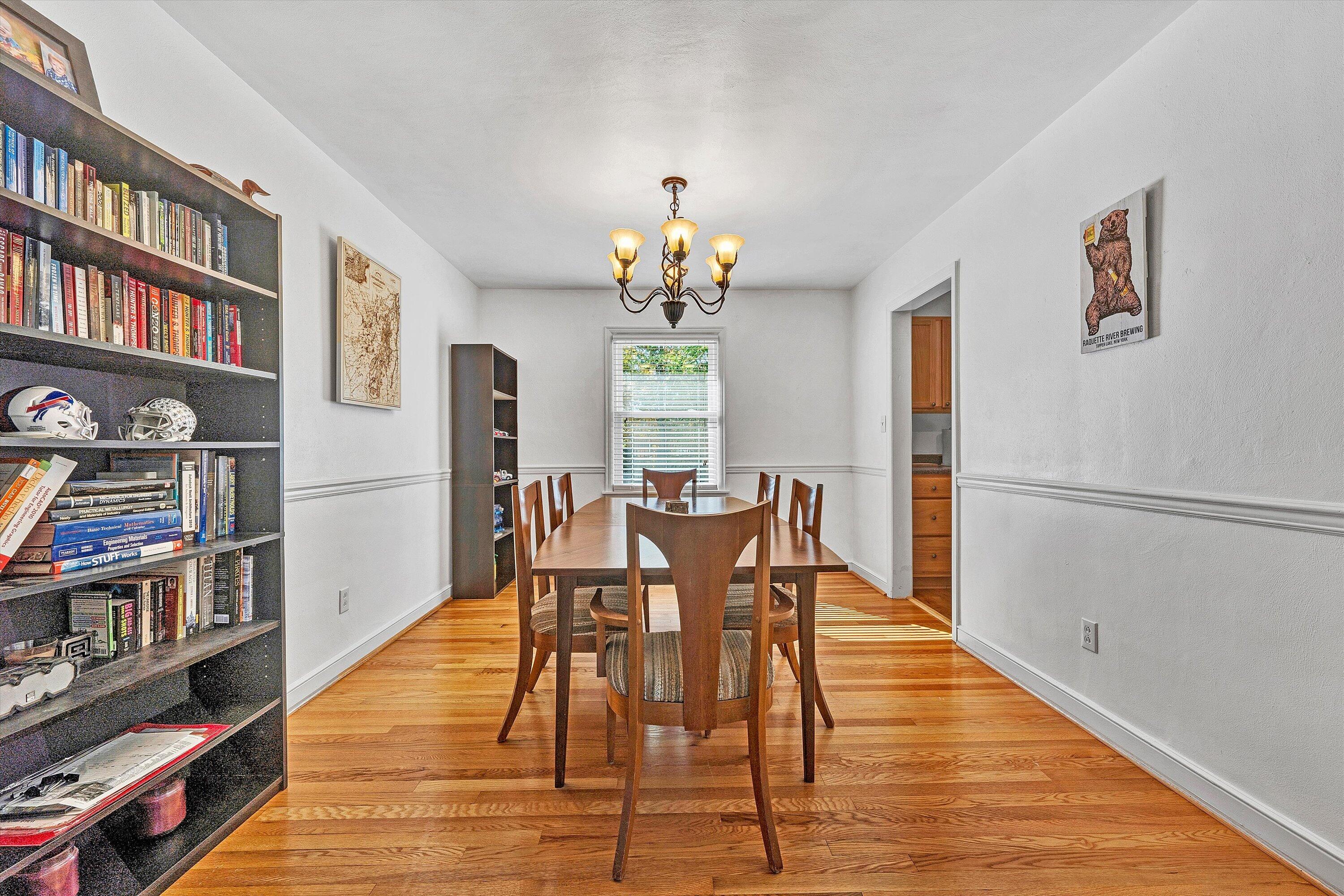 6836 Trevilian Road Roanoke, VA 24019 - Photo 13 of 47 a view of a dining room with furniture window and wooden floor