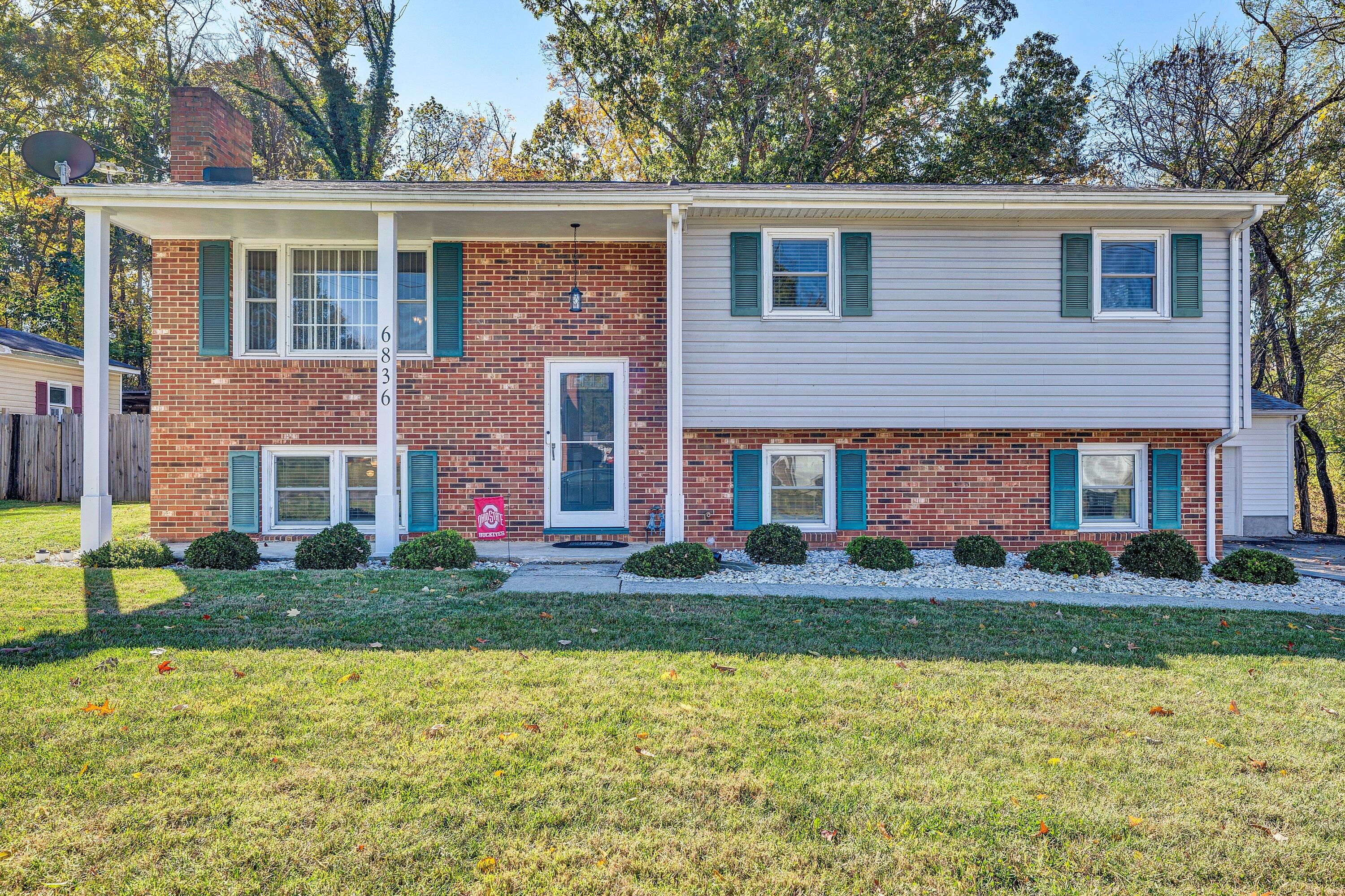 6836 Trevilian Road Roanoke, VA 24019 - Photo 2 of 47 a front view of a house with a yard