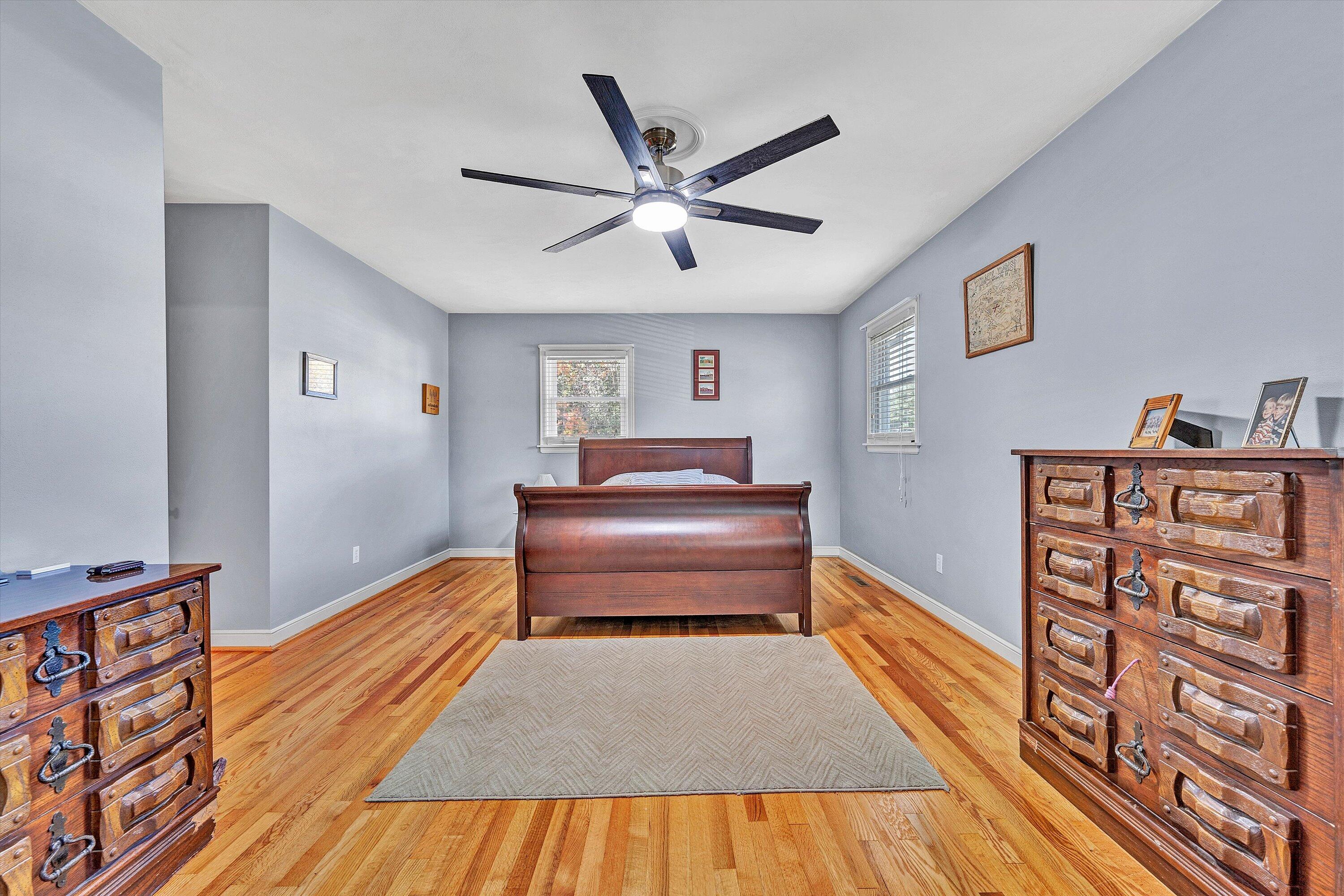 6836 Trevilian Road Roanoke, VA 24019 - Photo 24 of 47 a living room with furniture and a book shelf