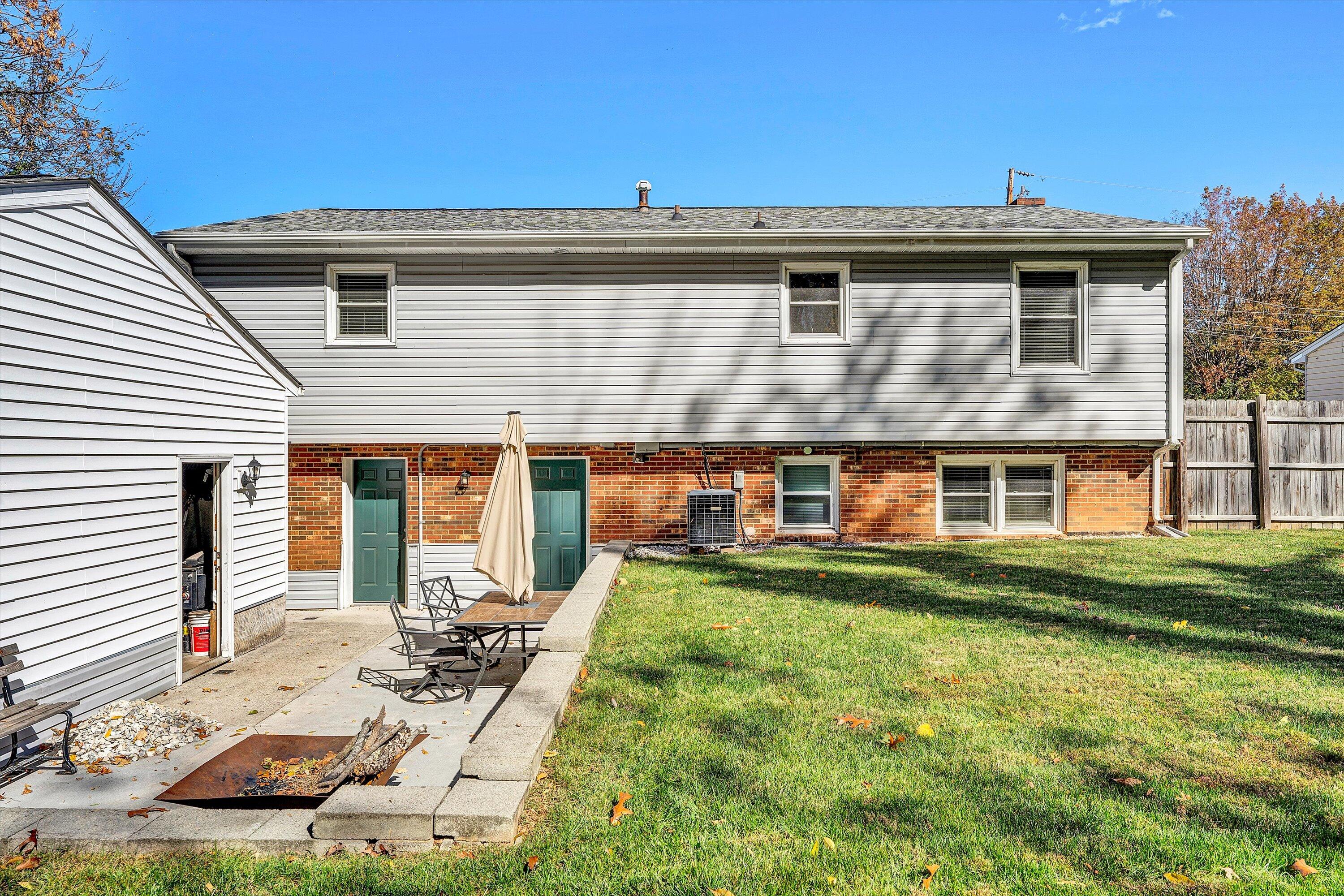 6836 Trevilian Road Roanoke, VA 24019 - Photo 36 of 47 a front view of house with yard outdoor seating and barbeque oven