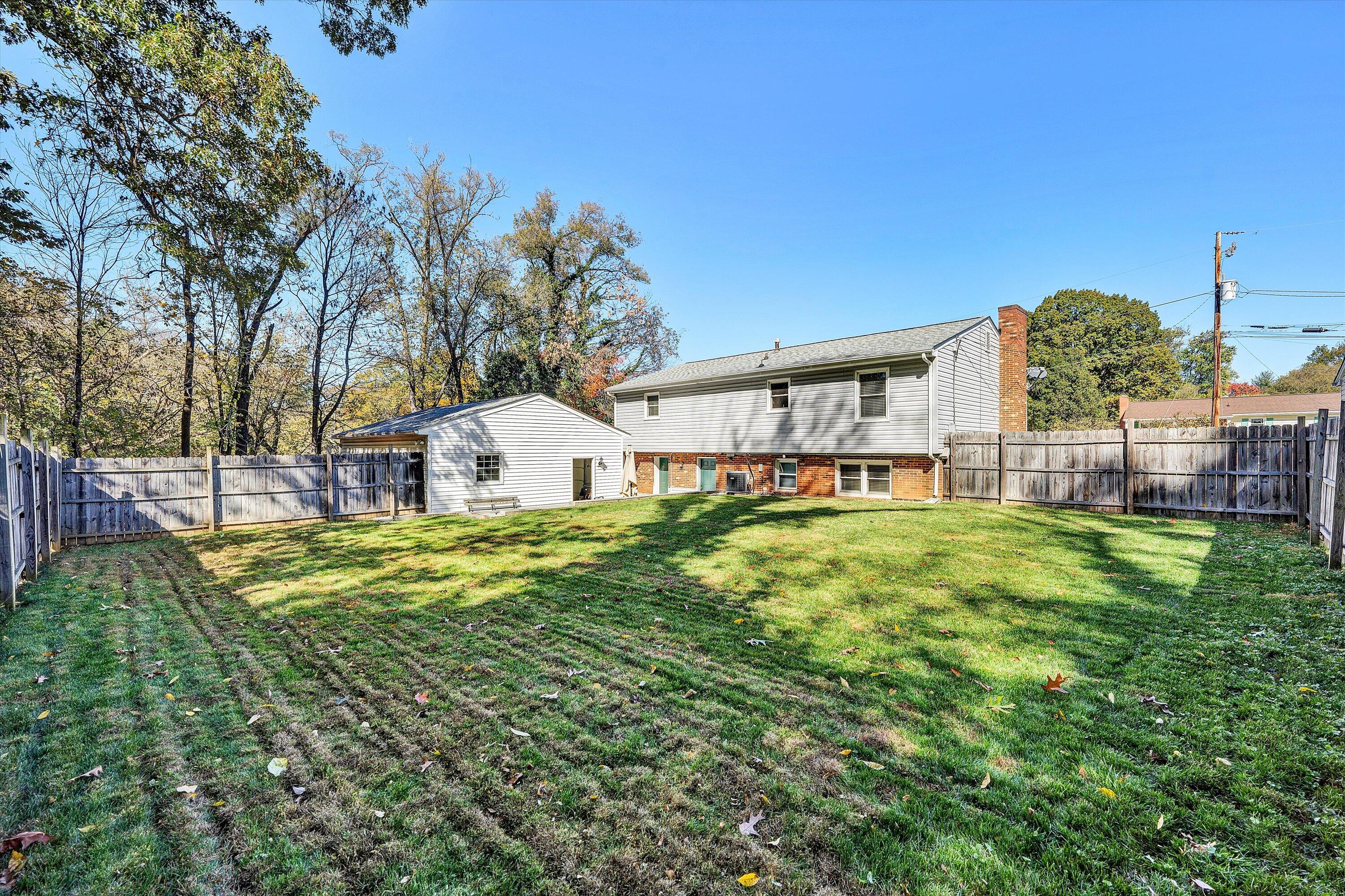 6836 Trevilian Road Roanoke, VA 24019 - Photo 40 of 47 a view of a house with a big yard and large trees