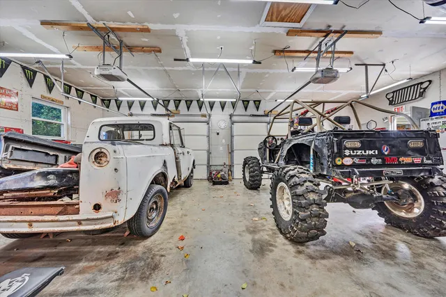 a front view of a house with a yard table and chairs