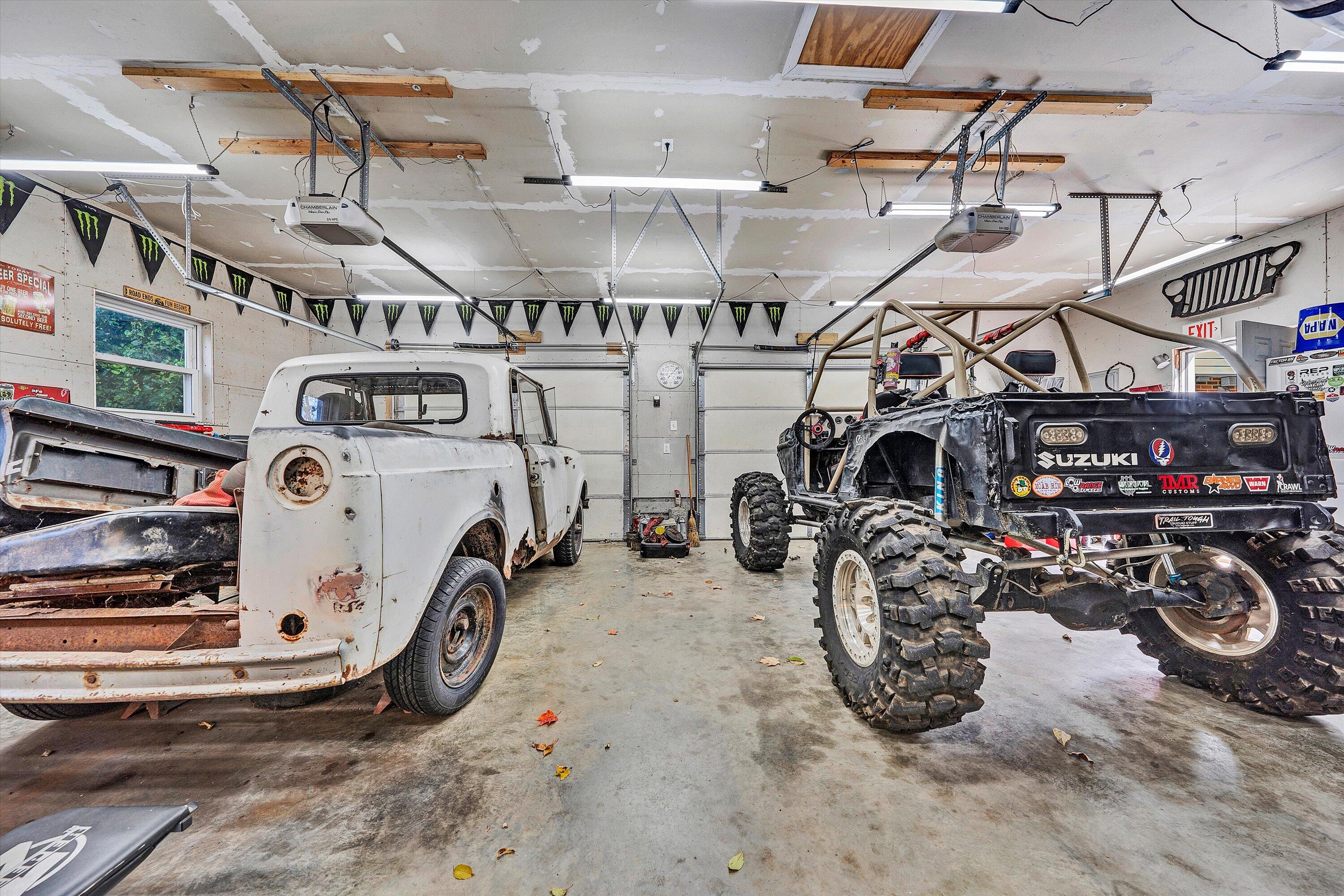 6836 Trevilian Road Roanoke, VA 24019 - Photo 44 of 47 a view of a garage with a bike and a car