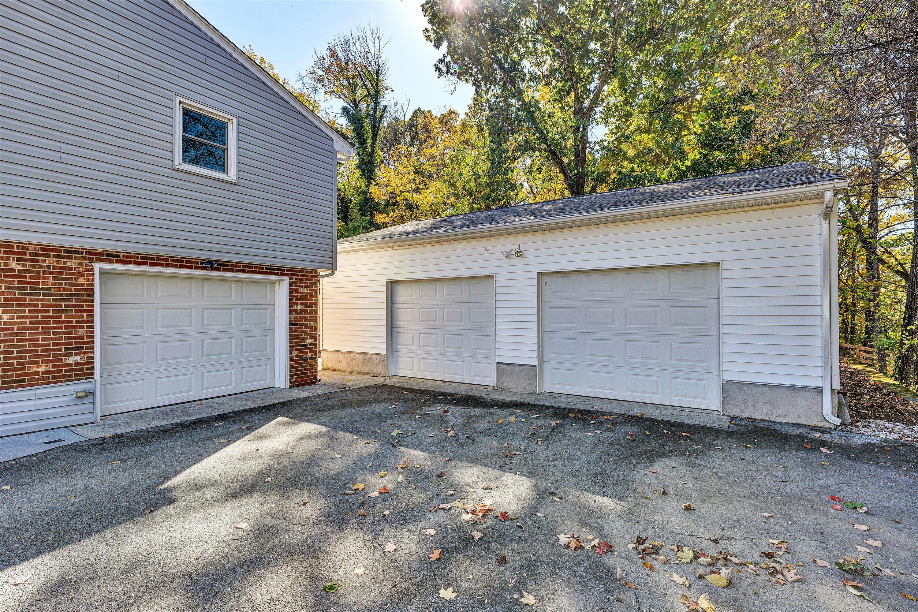 6836 Trevilian Road Roanoke, VA 24019 - Photo 45 of 47 a view of house with garage and yard