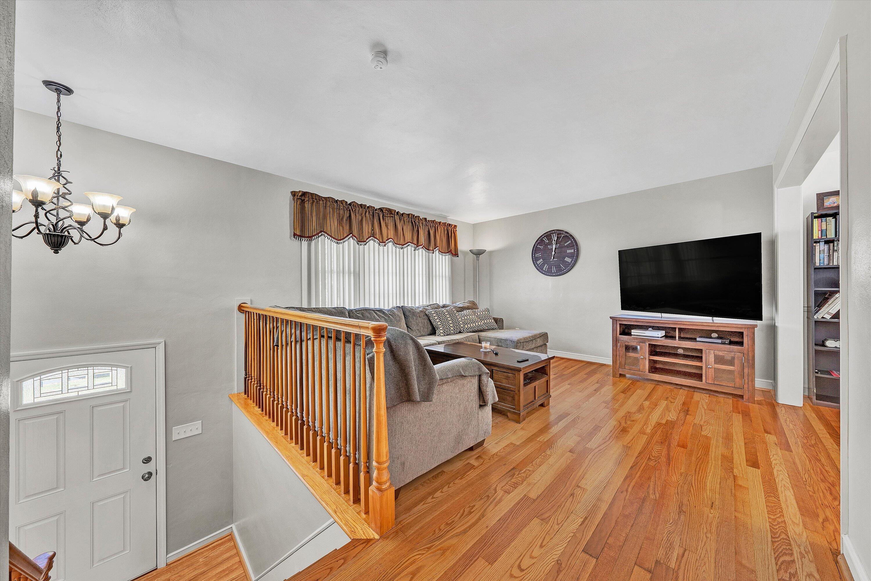 6836 Trevilian Road Roanoke, VA 24019 - Photo 9 of 47 a living room with furniture and a flat screen tv