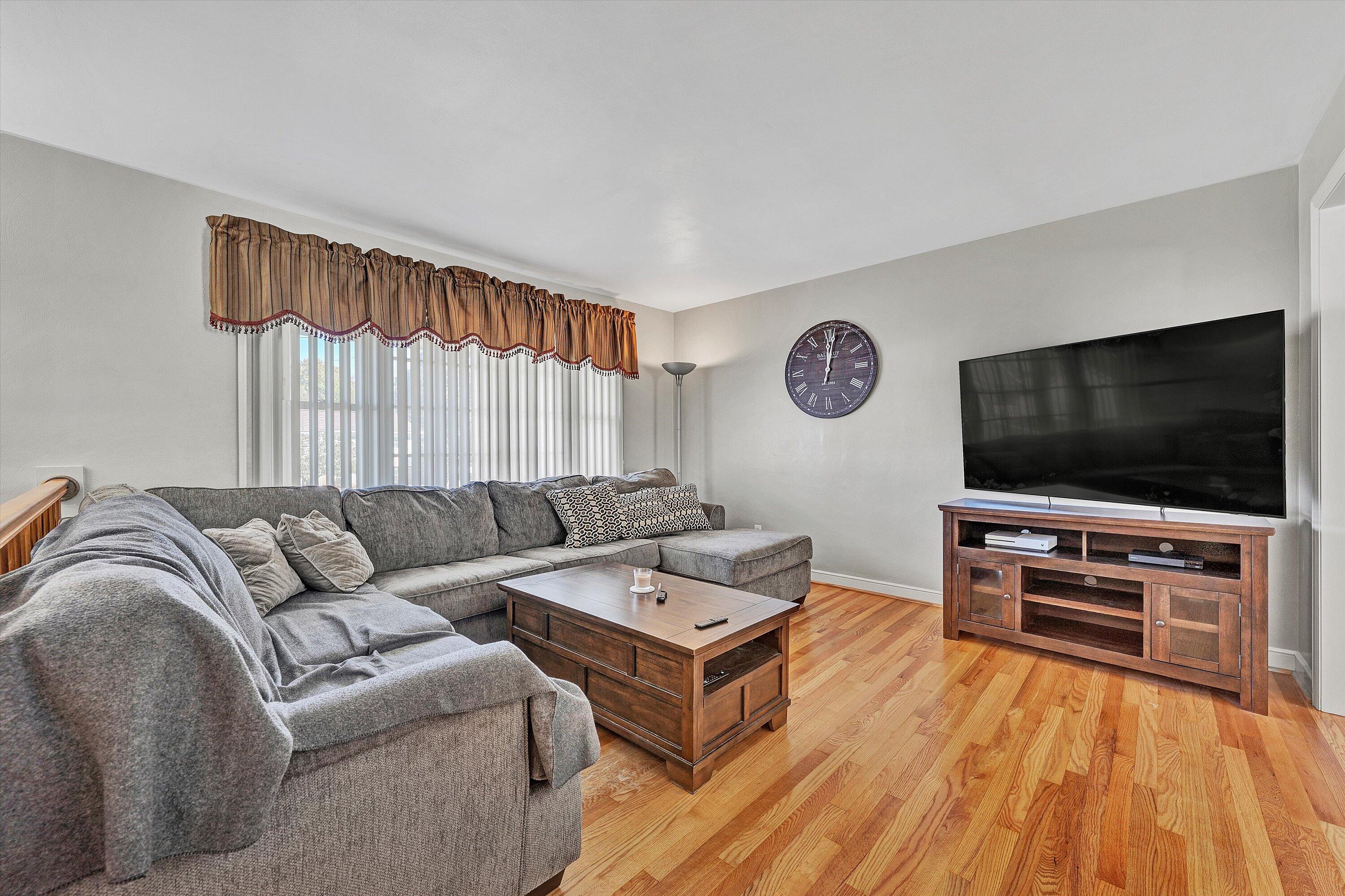 6836 Trevilian Road Roanoke, VA 24019 - Photo 10 of 47 a living room with furniture and a flat screen tv