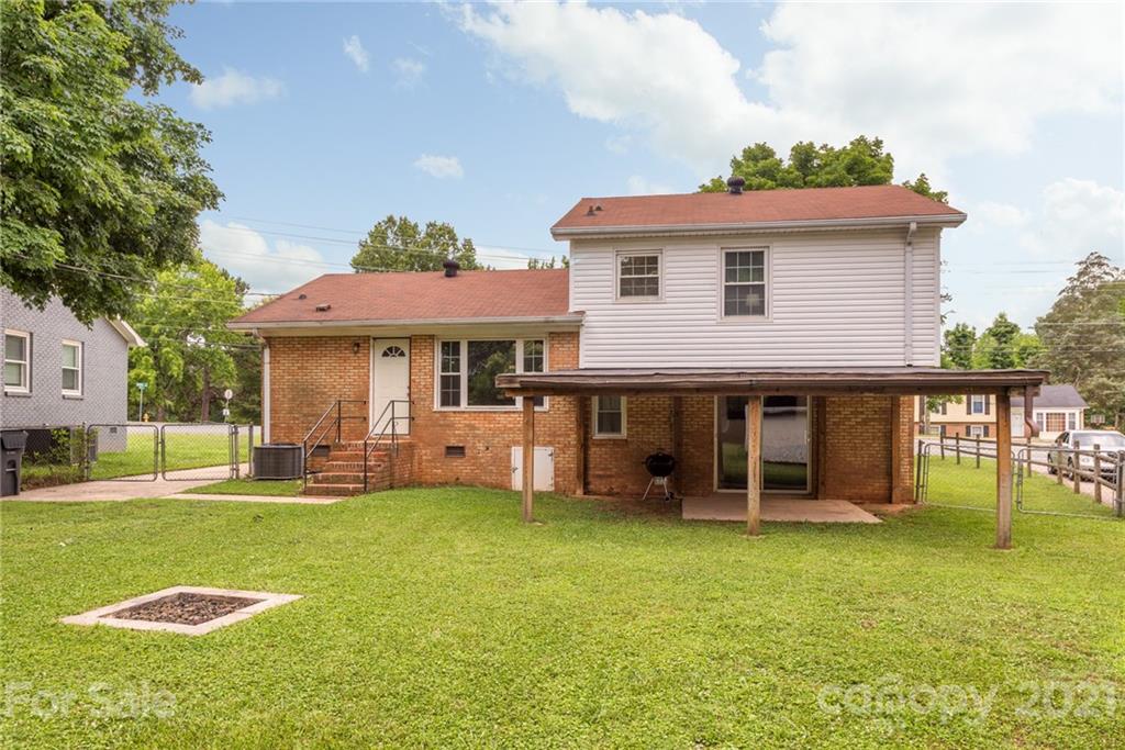 2531 Milton Road Charlotte, NC 28215 - Photo 19 of 19 a view of a house with a yard porch and sitting area