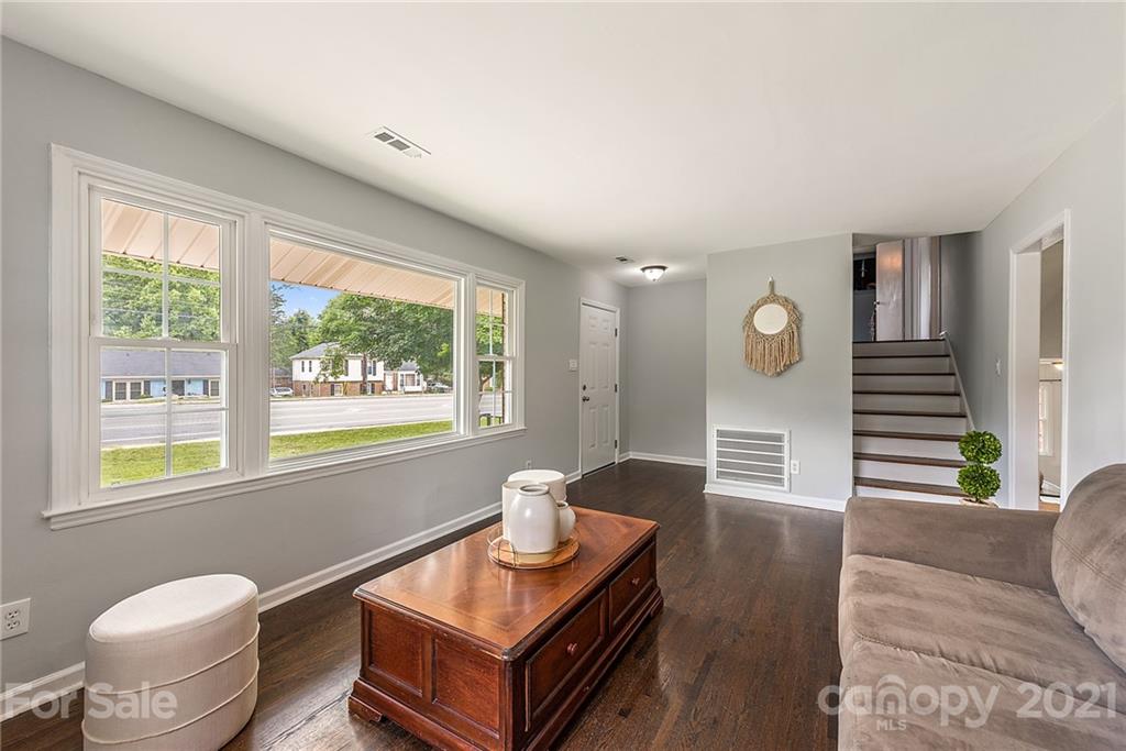 2531 Milton Road Charlotte, NC 28215 - Photo 5 of 19 a living room with furniture and a large window